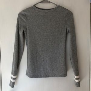 Gray shirt with stripes on sleeves